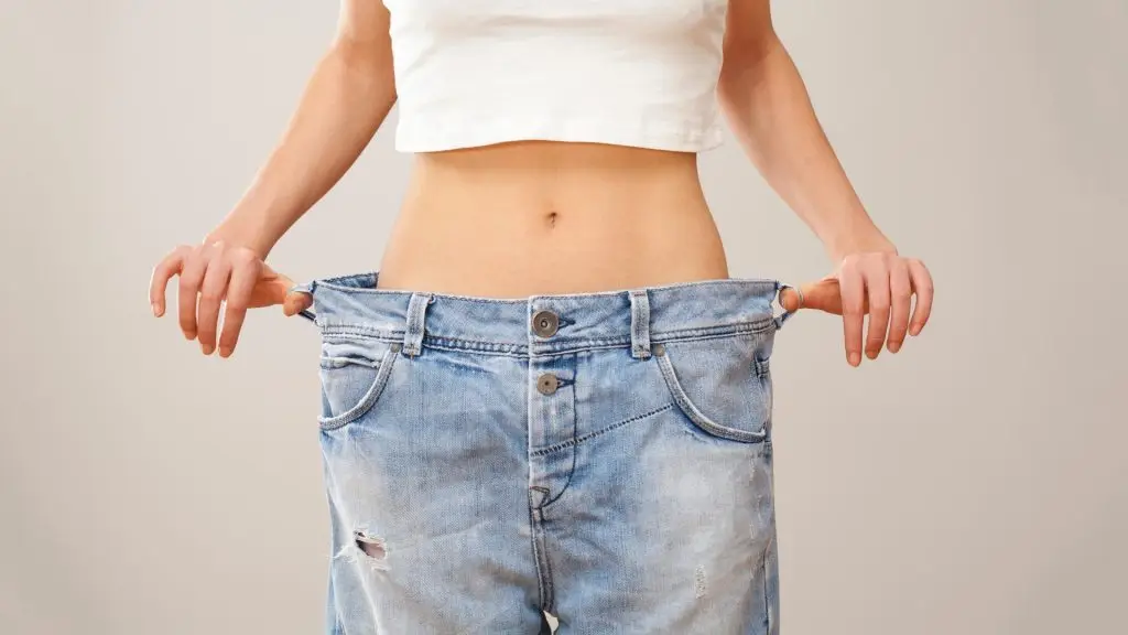 woman showing off dramatic weight loss results in northeastern ohio