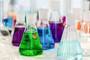glass beakers containing chemicals